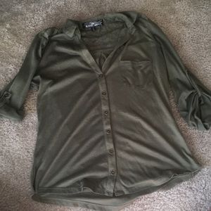 Green button up shirt with pocket.